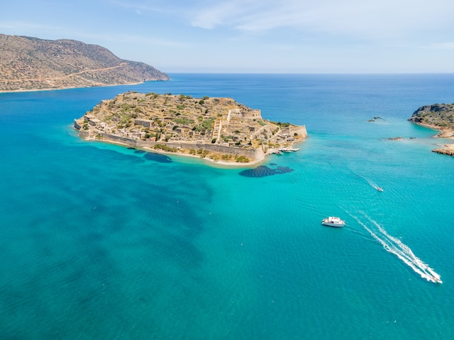 Mirabello Bay view by drone with Spinalonga island on Crete, Greece @ credit Depositphotos