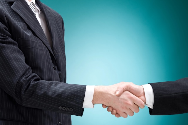 business man positive deal with handshake isolated