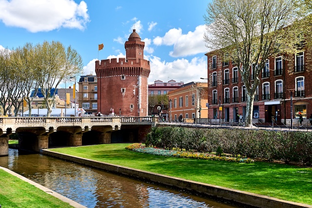 View to the Canal and Castle of Perpignan in springtime. Pyrenees-Orientales, France