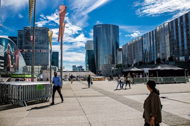 Paris, France - September 12, 2022 Cityscape and architecture of La Defense, a business district located in Greater Paris, skyscrapers surround the famous arch in the center of the esplanade