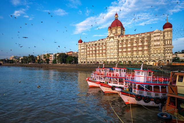 Tourist boats in front of the famous Taj Hotel in the morning