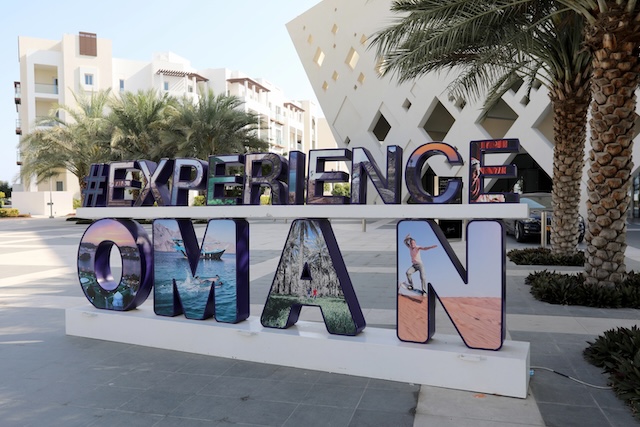 Muscat / Oman – February 11, 2020: Experience Oman sign on display in the Al Mouj (The Wave) district of the Omani capital Muscat
