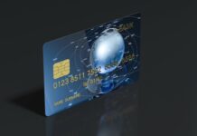 Voyage d’affaires | Capital One va acquérir Brex pour 5,15 milliards de dollars afin de renforcer les outils financiers du voyage d’affaires Blue bank card with dark background, 3d rendering. Computer digital drawing.