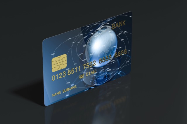 Blue bank card with dark background, 3d rendering. Computer digital drawing.