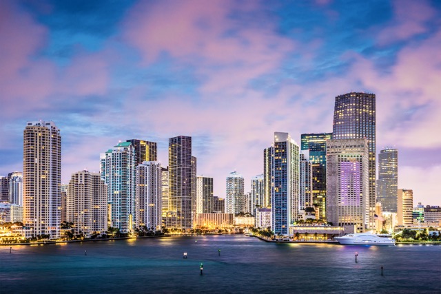 Skyline of Miami, Florida, USA at Brickell Key and Miami River.