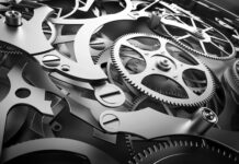 Éclairage, Suisse | Richemont en pleine métamorphose : vers la fin du modèle de groupe horloger ? mécanisme horloger @ credit Depositphotos