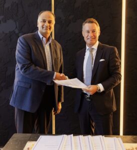 Prakash Pandey and Richard Crawford at the signing of St. Regis Queenstown